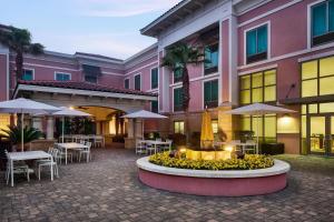 a courtyard with a fountain in front of a building at Hampton Inn & Suites Destin in Destin