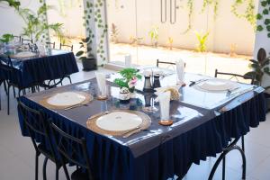 a blue table set up for a wedding reception at Trinco Diyash Beach Hotel in Trincomalee