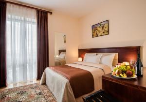 Postel nebo postele na pokoji v ubytování Arève Résidence Boutique Hotel + 37 fotografií