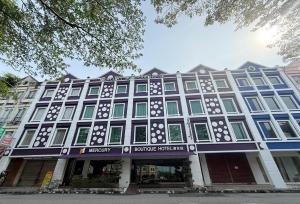 a large building with a science trust inn at Mercury Boutique Hotel in Malacca