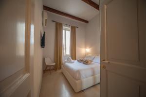 Postel nebo postele na pokoji v ubytování B&B Al Vico