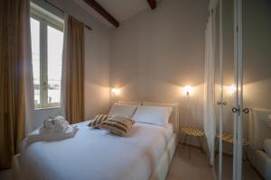 Postel nebo postele na pokoji v ubytování B&B Al Vico