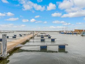 a group of boats docked at a dock in the water at Admiral Stuuv in Barth +44 photos