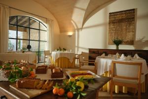 a room with a table with food on it at Belle Son Mas Luxury Finca Hotel in Porto Cristo