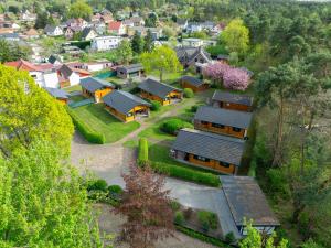 an aerial view of a residential neighborhood with houses at Bungalows am Senftenberger See in Großkoschen