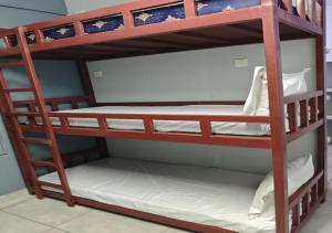 a couple of bunk beds in a room at Villa Victor in Pondicherry +4 photos