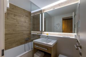 Koupelna v ubytování M Hotel