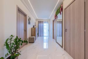 a corridor of a hospital with a hallway at Angel House in Ialysos