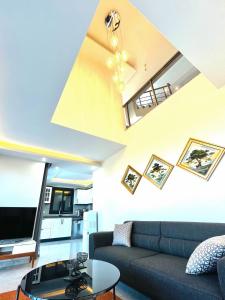 a living room with a couch and a table at Premium Homes in Didim