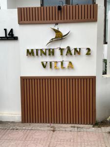 a sign on the side of a building at Minhtan2 villa in Dong Hoi