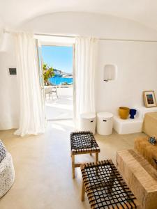 a living room with a view of the ocean at Maridea - Villa Zagara in Ponza