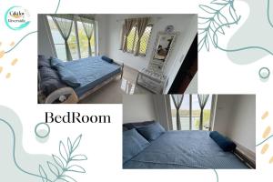 a room with a bed and a couch and a mirror at Riverfront By Gikijoy in Agarvado