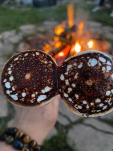 a person holding a spoon filled with food at Lemon home in Dziemiany
