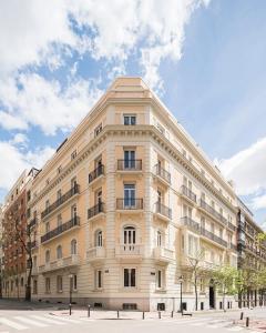a large white building on a city street at Mercer Madrid in Madrid