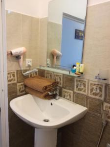 Koupelna v ubytování Apna Homestay Apartments