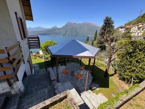 a gazebo with a view of a lake at Villa Bianca in Perledo