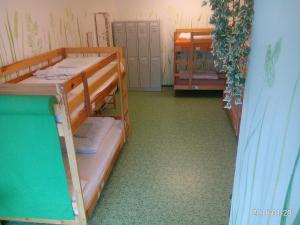 Postel nebo postele na pokoji v ubytování Max Hostel