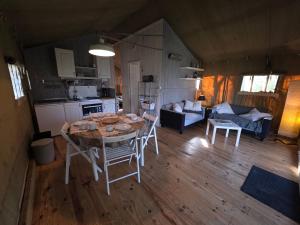 an overhead view of a kitchen and a living room at La clés des champs in Loubeyrat +2 photos
