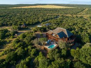 an aerial view of a house with a swimming pool at Addo Nyala Guest Lodge in Paterson