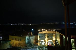 a night view of a building with lights on at Rock Mansion Cappadocia in Nar