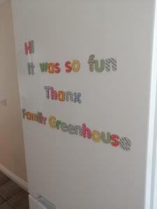 a refrigerator with words on the side of it at Large countryside home in Tow Law