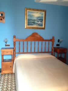 Postel nebo postele na pokoji v ubytování Hostal Aranda