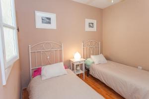 A bed or beds in a room at Apartamento Centro Jerez Carbón