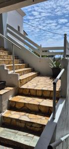 a set of stairs leading up to a house at Apartment K2 in Pyrgi