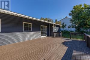 a large deck in front of a house at St Andrews Guest Home in St. John's