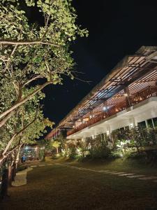 a building is lit up at night at Terra Verde Resort Guindulman Bohol in Guindulman