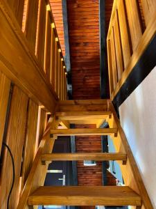 an overhead view of a wooden staircase in a building at Vila Mirra in Teslić