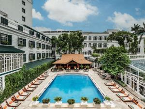 an overhead view of a swimming pool at a hotel at Sofitel Legend Metropole Hanoi in Hanoi