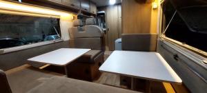 two tables in the back of an rv at Camper Rental Elbasan in Elbasan