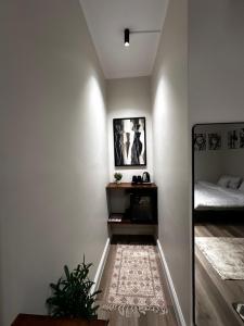 a small room with a bed and a rug at شقق مخدومة in Jazan