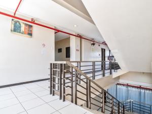 a view of the lobby of a hospital with stairs at California Signature Suites in Sudtungan