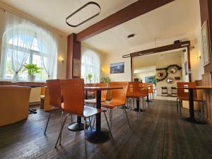 a dining room with a table and chairs at Residence Vysta in Prague