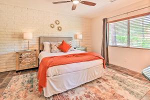 a bedroom with a bed and a ceiling fan at Patio & Panoramic Desert Views: Sedona Getaway! in Sedona