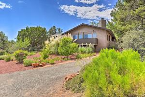 a house with a road in front of it at Patio & Panoramic Desert Views: Sedona Getaway! in Sedona