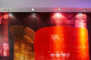 a window with red and orange curtains and lights at Hotel Tórshavn in Tórshavn