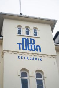 a sign on the side of a building at Old Town Reykjavik in Reykjavík