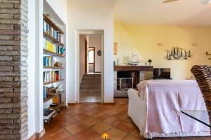 a living room with a couch and a fireplace at Villa Teresa Simius Beach Front in Simius +66 photos