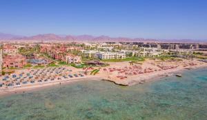 an aerial view of a beach with umbrellas at Charmillion Sea Life Resort in Sharm El Sheikh