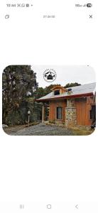 a rendering of a house with a photo of it at Cabaña kobata in Villa Mills