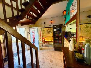 a view of a restaurant from the stairs of a restaurant at Pousada Vison Ubatuba - Praia Grande in Ubatuba +19 photos