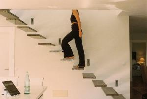 a person riding a skateboard down some stairs at UNIQUE Homes Lajares - adults only in Lajares