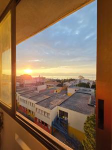 a view of a city from a window at Appartamento Polidea in Reggio di Calabria