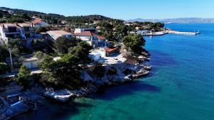 an aerial view of a small island in the water at Marco Polo House island Šolta in Grohote