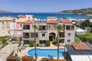an image of a villa with a swimming pool at Gianna Apartments in Almyrida