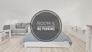 a room no parking sign in a living room at Apartmaji Diversorio in Izola