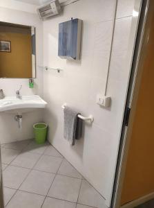a bathroom with a sink and a mirror at Casa Belvedere - A Due Passi Dal Centro - ItalyWeGo in Narni +13 photos